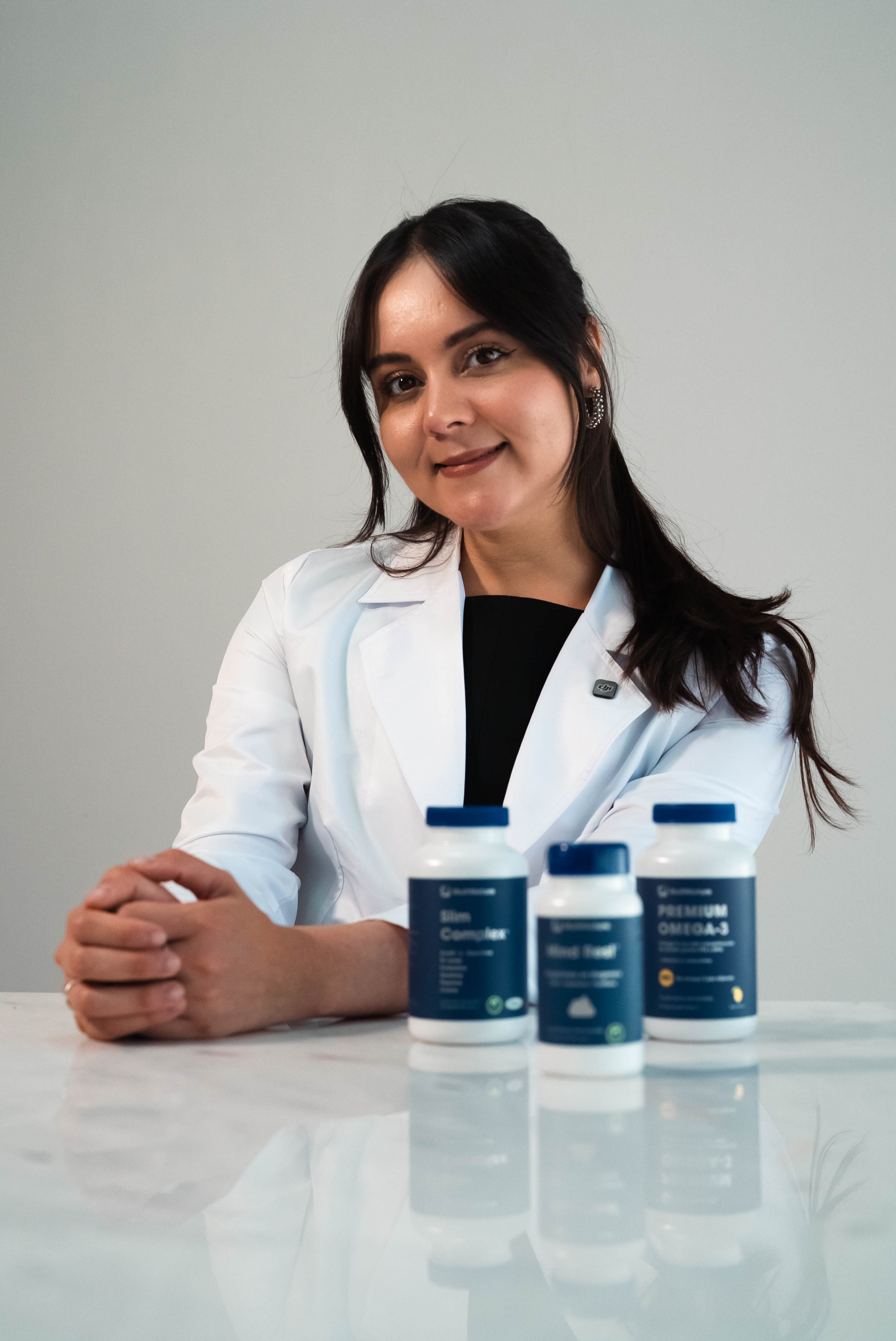 Health professional with Multinature products in a clinic setting